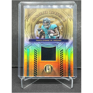 2024 Panini Gold Standard Travis Etienne Jr. Gold Rush Patch 181/299